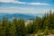 Panoramic view of picturesque Carpathian Mountains landscape with forest slopes, mountain ranges and peaks. Holidays in the