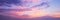 Panoramic view of pink and purple sky at sunset