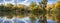 Panoramic view of the pond in Garin Dry Creek Pioneer Regional Park at sunset, San Francisco bay, California