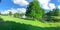 Panoramic view pond with water fountain in small American neighborhood