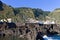 Panoramic view of Porto Moniz, a small village in the Atlantic coast of Madeira island with terraced fields