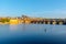 Panoramic view of Prague Castle and Charles Bridge on sunny spring morning, Praha, Czech Republic