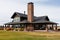 panoramic view of a prairie house with large central chimney