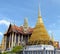 Panoramic view of the Prasat Phra Thep Bidon and the Golden Chedi in Wat Phra Kaew Complex. Bangkok, Thailand.