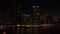 Panoramic view from promenade on night city and high skyscrapers in Dubai Marina