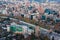 Panoramic view of Providencia district with Mapocho River and the snowed Andes mountain range in the back.