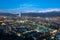 Panoramic view of Providencia and Las Condes districts with Mapocho River and Los Andes Mountain Range in Santiago