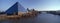 Panoramic view of the Pyramid Sports Arena in Memphis, TN with statue of Ramses at entrance