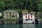 Panoramic view of quaint traditional waterfront houses on majestic Lake Como, Lombardy, Italy.