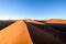 Panoramic view of red sand dunes in Sossusvlei near Sesriem in famous Namib Desert in Namibia, Africa