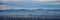 Panoramic view of Reno, Nevada skyline on overcast winter morning.