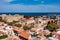 Panoramic view of Rhodes old town on Rhodes island, Greece. Rhodes old fortress cityscape with sea port at foreground. Travel