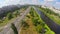 Panoramic view, river and busy street with cars, aerial shot