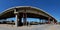 Panoramic view of a road overpass under construction on the M5 federal highway in the morning sun.
