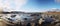 A Panoramic View of a Rocky Beach