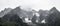 Panoramic view of the rocky peaks of the Mont Blanc massif in stormy weather