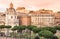 Panoramic view rooftops of Rome historical architecture city skyline at sunset, Italy.