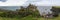 Panoramic view of the ruins of Dunluce Castle and its beach in Northern Ireland