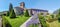 Panoramic view of Saint Victor church at left and the part of the castle from the garden. Saint Etienne metropole