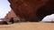 Panoramic view of sand beach with the arch on Legzira beach with arched rocks on the Atlantic coast in Morocco