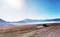 A panoramic view in the sand of mount bromo in a four-wheel-drive vehicle