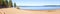 Panoramic view of a sandy beach, pine trees, pond or lake. Sand dunes on the beach. Beautiful summer landscape. widescreen.