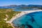 Panoramic view of sandy beach, yachts and sea with azure water, in Villasimius, Sardinia Sardegna island, Italy. Holidays, the