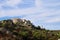 Panoramic view of Sant Antonino, a picturesque hillside village in Balagne. Corsica, France.