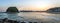 Panoramic view of Sao Vicente city Skyline and Urubuquecaba Island at sunset - Santos, Sao Paulo, Brazil