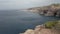 Panoramic view of Sardinia wilderness coastline, cliffs and crags and blue sea