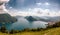 Panoramic view of the scenic Lugano Lake in Switzerland by day as seen from Mont Bre