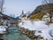 Panoramic view of scenic winter landscape in the Bavarian Alps with famous Parish Church of St. Sebastian in the village of Ramsau