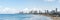 Panoramic view. Seascape and skyscrapers on background in Tel Aviv, Israel.