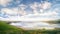 Panoramic view of seashore in County Cork on a hazy and cloudy day