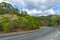 Panoramic view from the serpentines of the highway A-397 Ronda - Malaga. Spain, Andalusia Mountain landscape on a sunny da