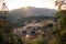 Panoramic view of the setting sun and Tianluokeng Tulou, Fujian, China