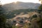 Panoramic view of the setting sun and Tianluokeng Tulou, Fujian, China