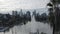 Panoramic view of Silver Lake and Downtown Los Angeles, breathtaking crane vertical up aerial shot, California, USA