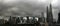 Panoramic view of skyscrappers in Kuala Lumpur, cloudy and rainy sky.