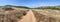 Panoramic view of small dry dusty trails in the valley