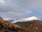 Panoramic view of snow peaked mountain in autumn