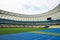 Panoramic view of soccer field stadium and stadium seats.