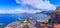 Panoramic view of the Sorrento coast in Campania, southern Italy. Townscape with harbor: Vesuvius in the background.