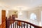 Panoramic view of spacious foyer from staircase landing