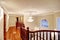 Panoramic view of spacious foyer from staircase landing