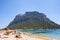 Panoramic view of Spiaggia Spalmatore di Terra beach of Isola Tavolara island on Tyrrhenian Sea off northern coast of Sardinia,