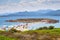 Panoramic view of Spiaggia Spalmatore di Terra beach of Isola Tavolara island on Tyrrhenian Sea off northern coast of Sardinia,