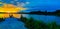 Panoramic view Sports Fishermen at Sunset early fall with beautiful skyline over Ed Zorinsky lake Omaha Nebraska. Water reflection