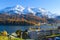 Panoramic view of St. Moritz Lake and snow-covered mountain.