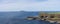 Panoramic view on Staffa Island and Fingals Cave or The Giants Causeway off the coast of Scotland